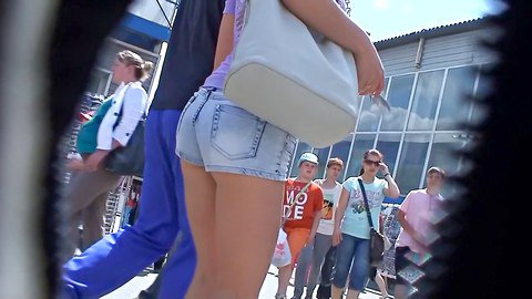 Spying the hot ass in tight jeans shorts