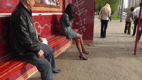 Spycam upskirt of girl on the bus stop